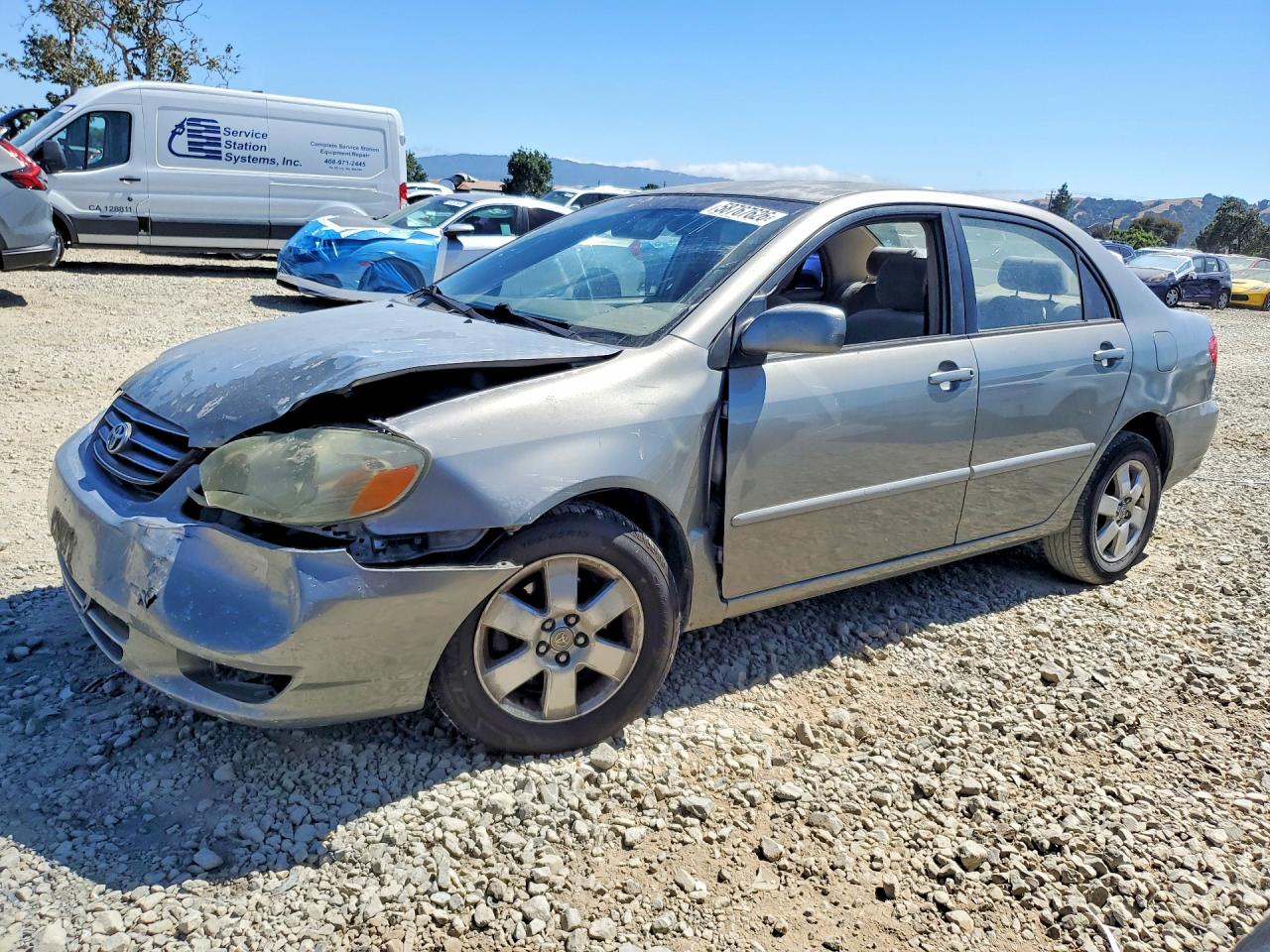 2004 Toyota Corolla CE, VIN JTDBR32E042027184 — Front end