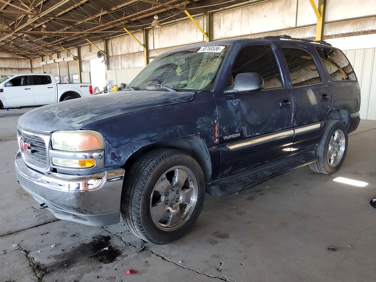 2002 GMC Yukon SLE, VIN 1GKEC13VX2J285804 — Vandalism