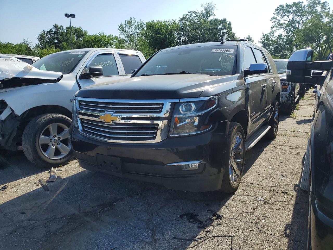 2016 Chevrolet Suburban LTZ, VIN 1GNSKJKC8GR427780 — Side