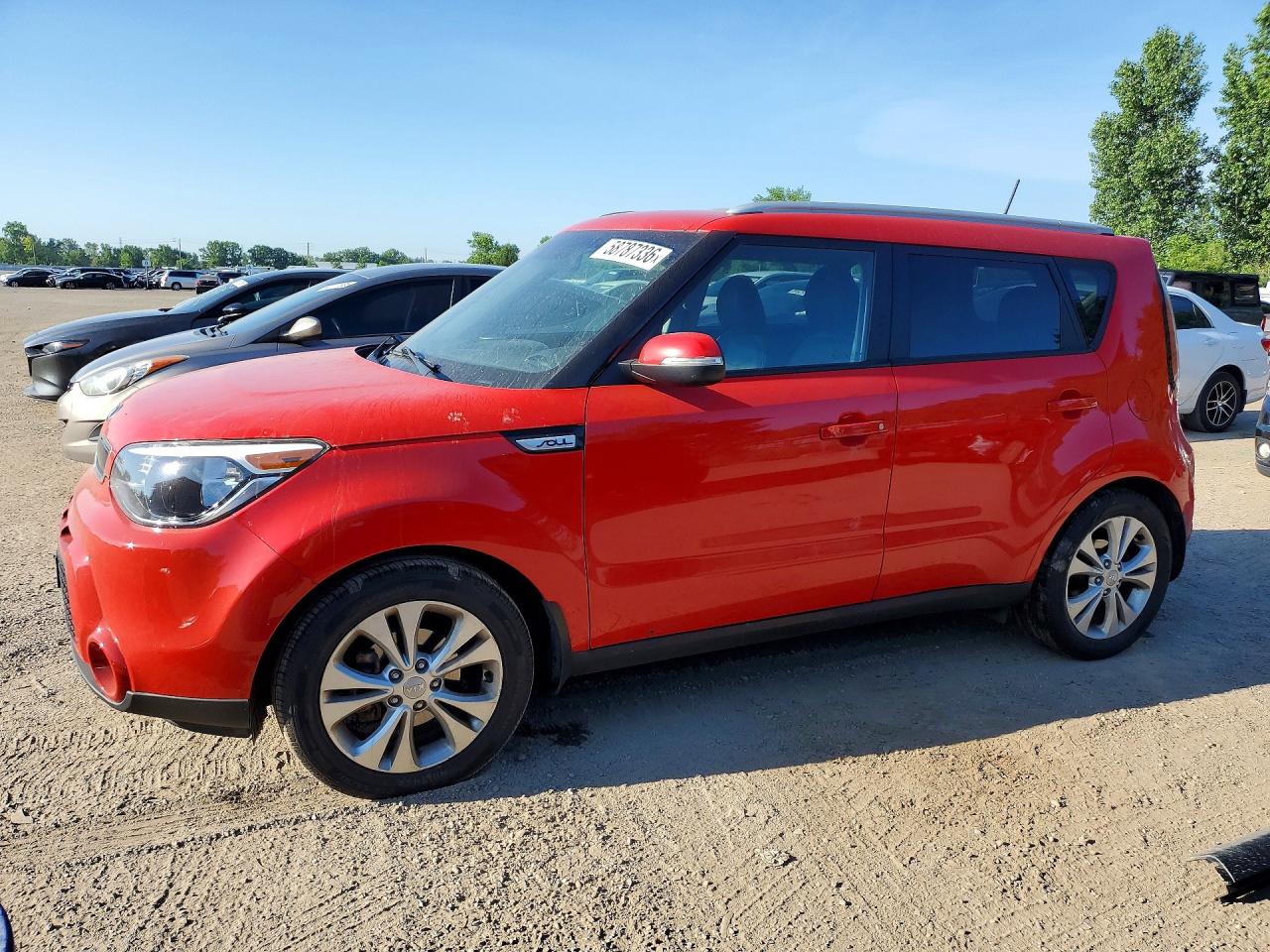 2015 Kia Soul +, VIN KNDJP3A58F7779885 — Side