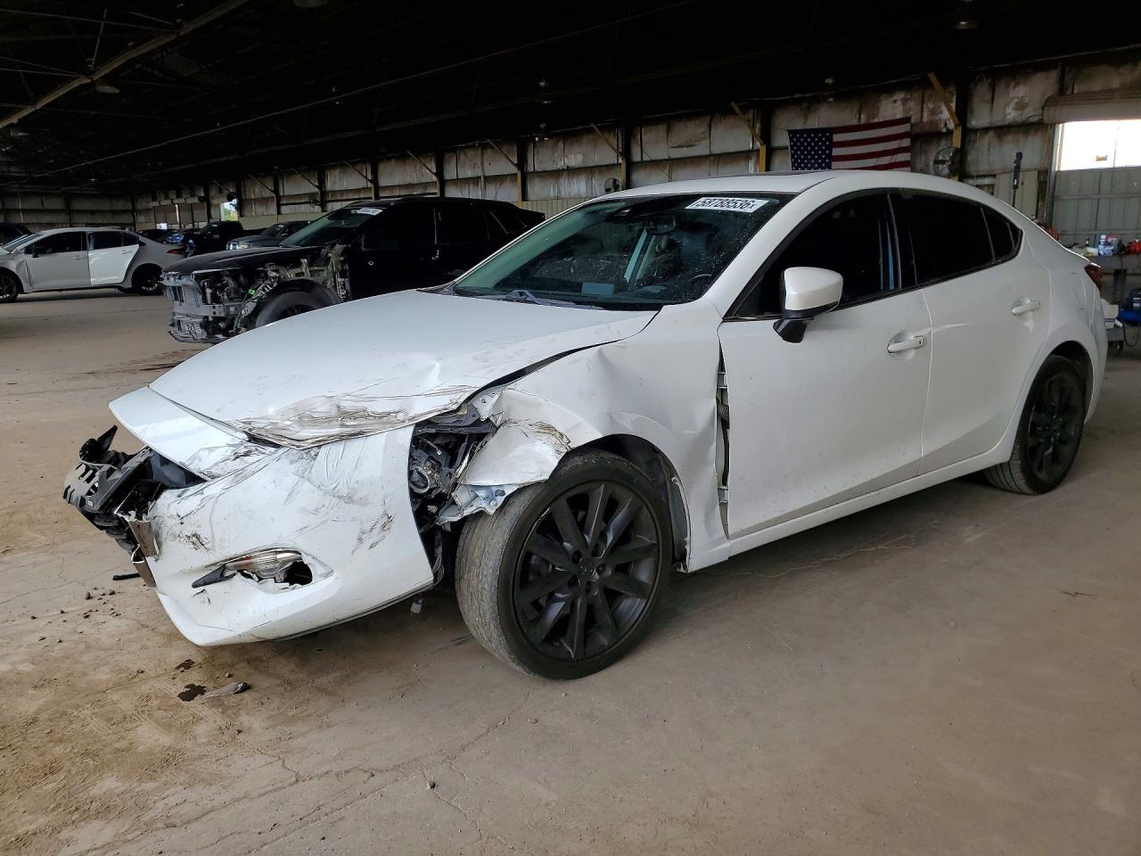 2017 Mazda 3 Grand Touring, VIN 3MZBN1W30HM128522 — Front end