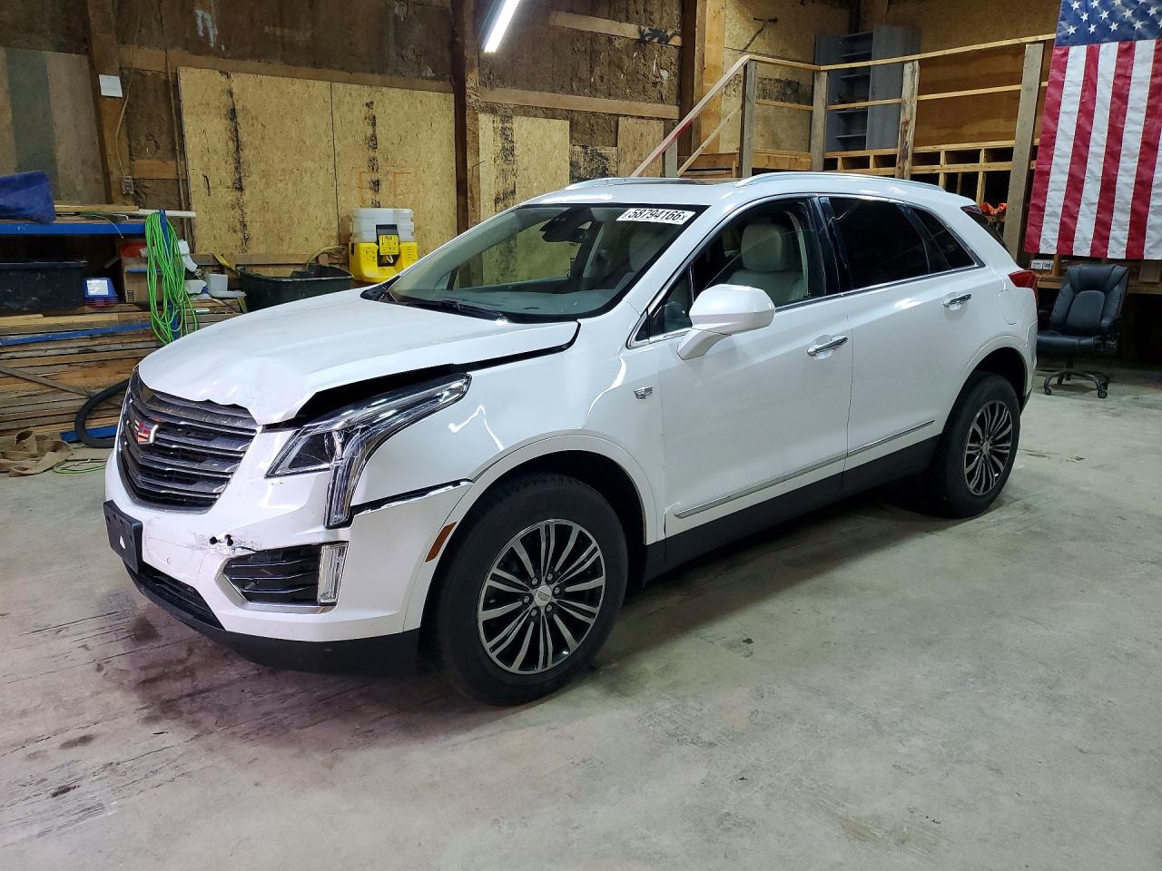 2017 Cadillac XT5 Luxury AWD, VIN 1GYKNDRS1HZ305420 — Hail