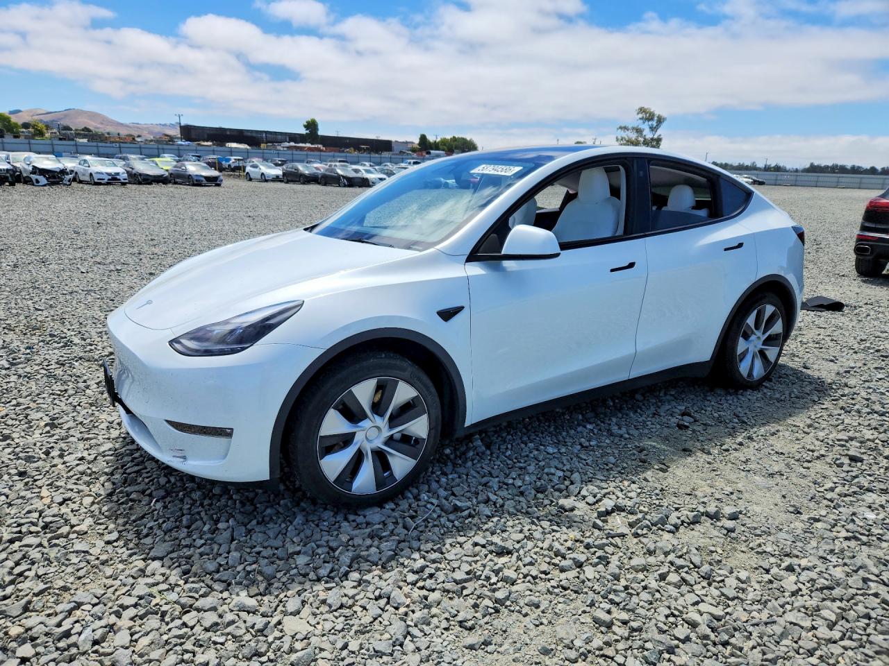 2023 Tesla Model Y Long Range, VIN 7SAYGAEE4PF683506 — Rear end