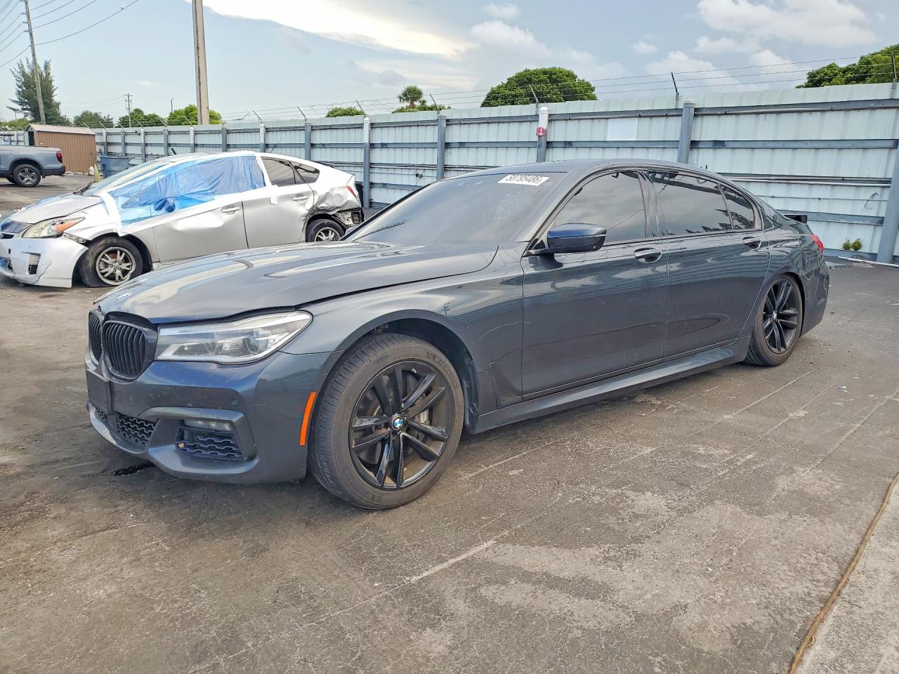 2016 BMW 7 Series 750i xDrive, VIN WBA7F2C52GG418655 — Side