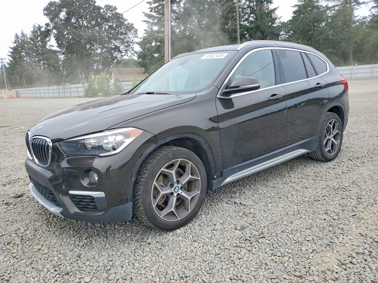 2018 BMW X1 sDrive28i, VIN WBXHU7C33J3H43750 — Front end