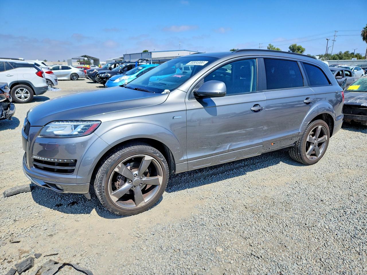 2015 Audi Q7 Premium Plus, VIN WA1LGAFE3FD030056 — Side