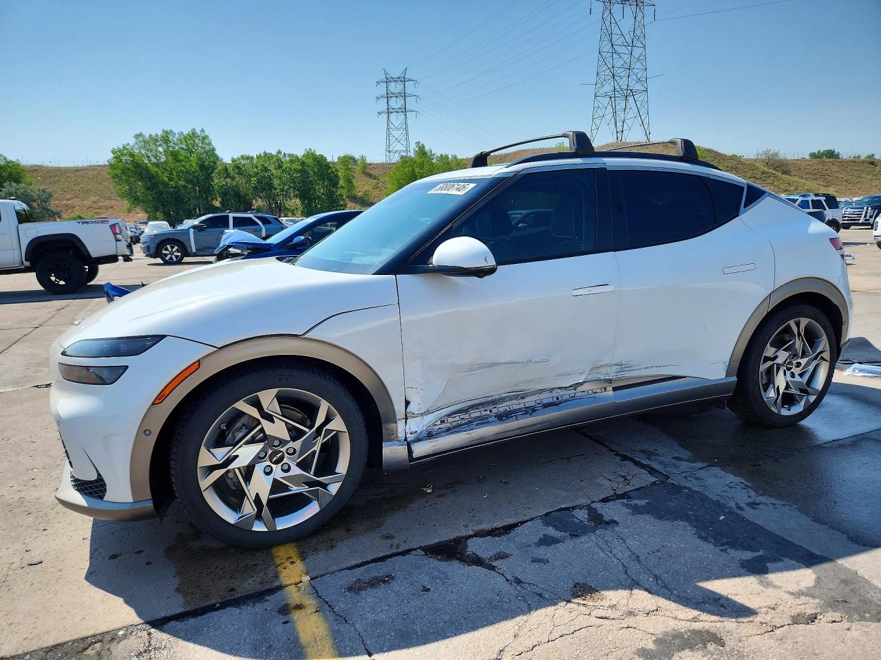 2023 Genesis GV60 Performance, VIN KMUKEDTB5PU014409 — Side