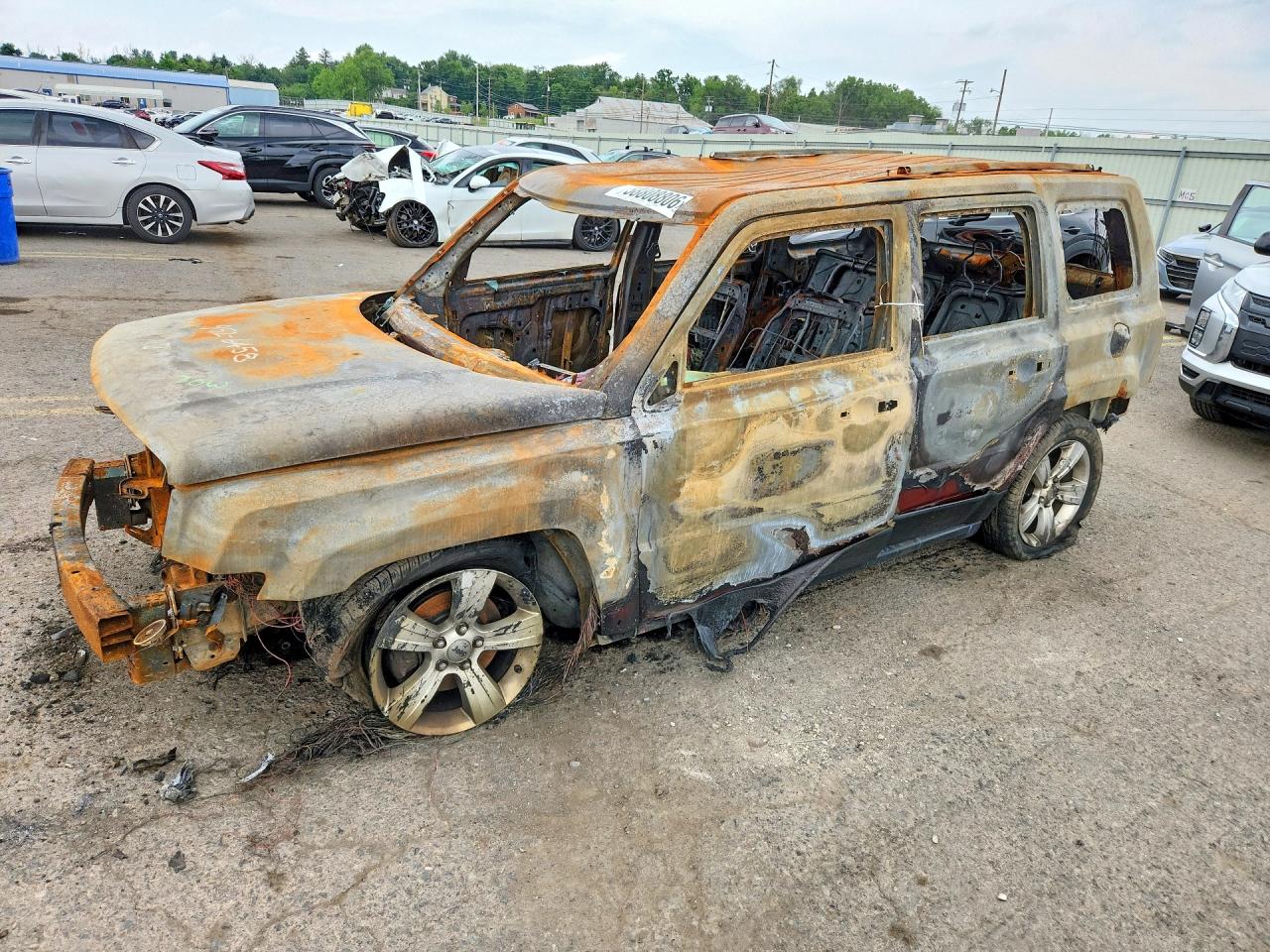 2012 Jeep Patriot Latitude, VIN 1C4NJRFB0CD603818 — Burn