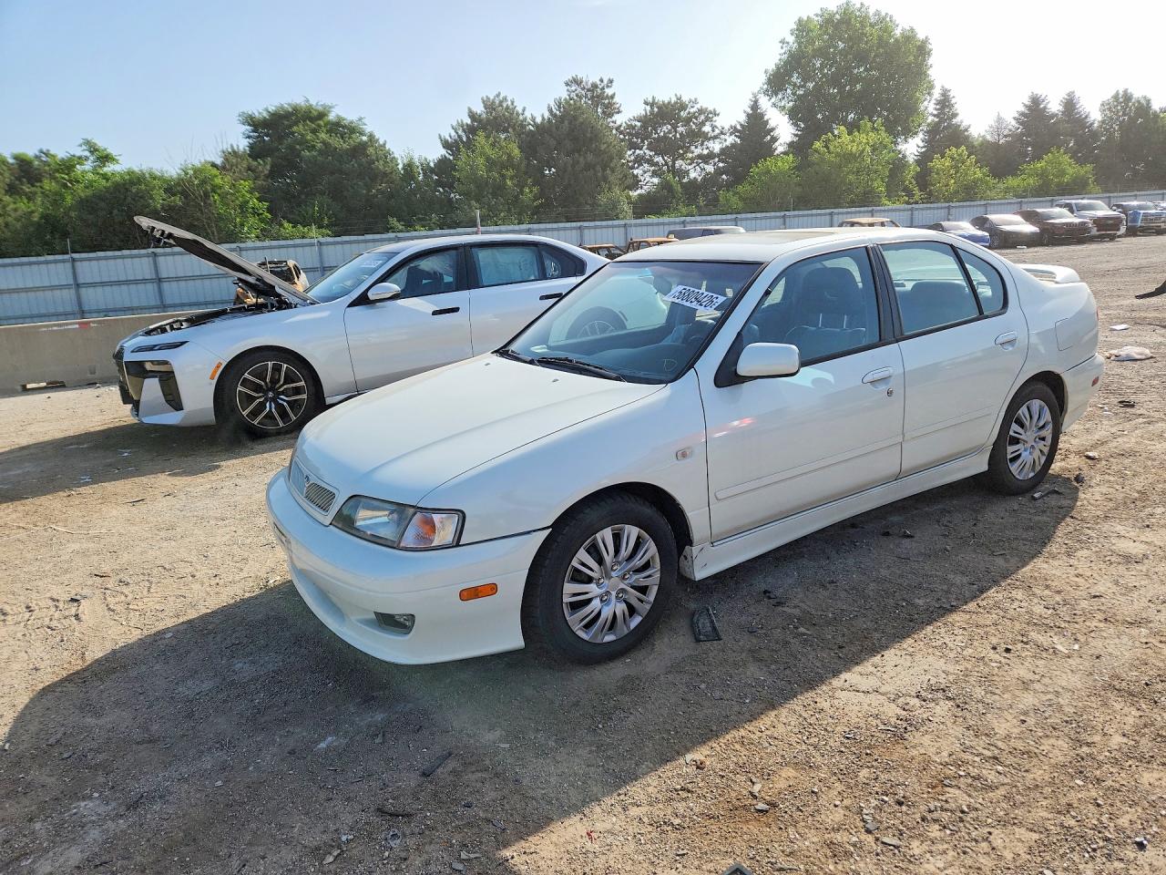 2002 Infiniti G20 Luxury, VIN JNKCP11A82T510750 — Side