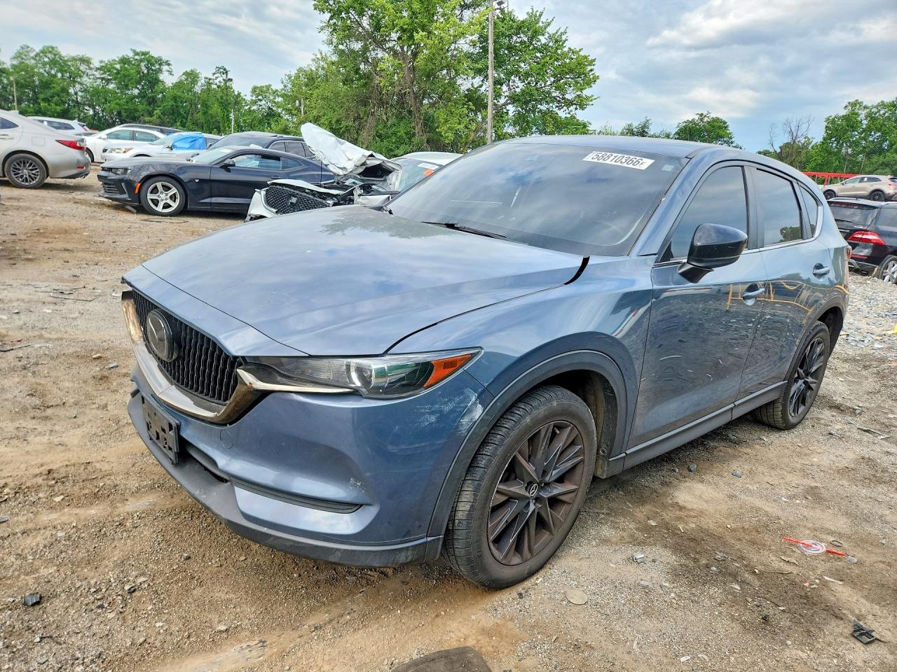 2021 Mazda CX-5 Carbon Edition, VIN JM3KFBCY9M0366380 — Side