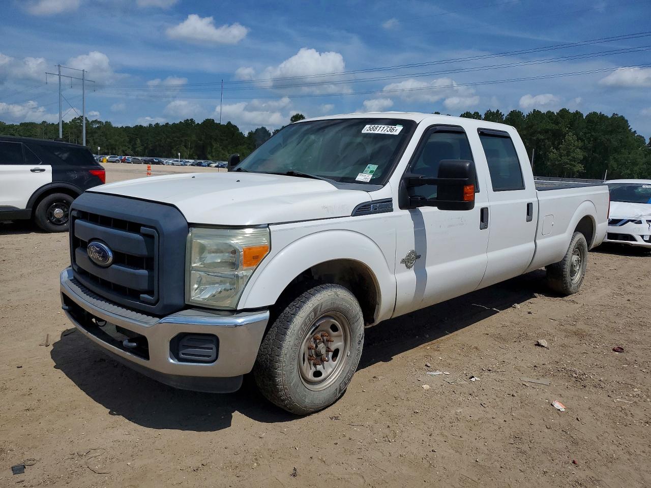 2015 Ford F-250 Lariat, VIN 1FT7W2AT5FEB39165 — Мелкие вмятины и царапины