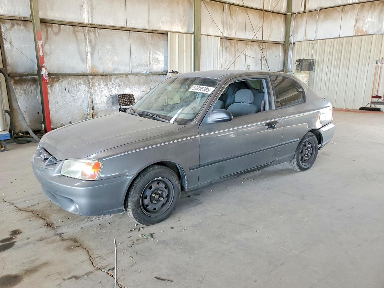 2001 Hyundai Accent L, VIN KMHCF35G71U134481 — Бок
