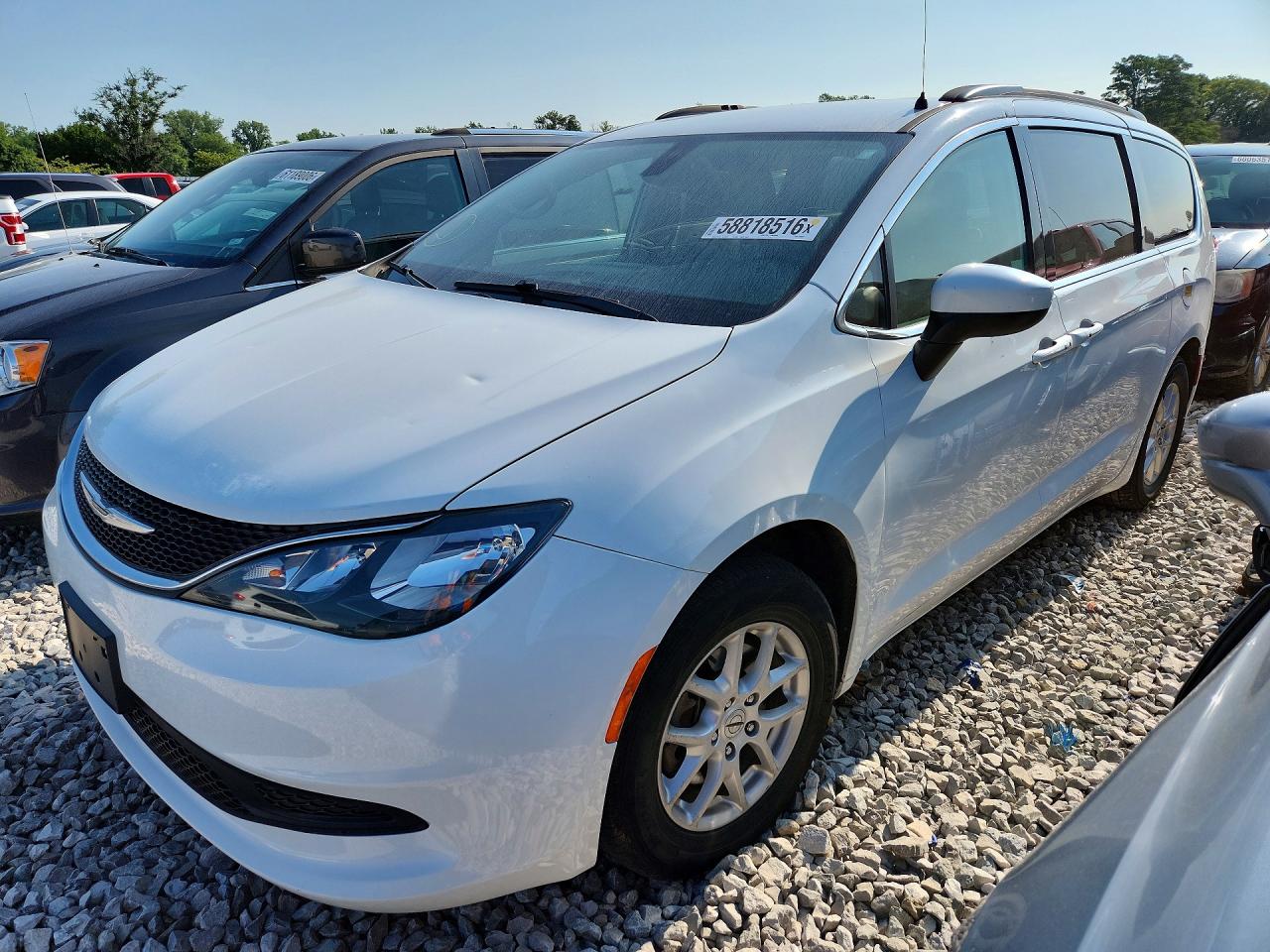2021 Chrysler Voyager LXi, VIN 2C4RC1DG7MR545653 — Minor dents and scratches