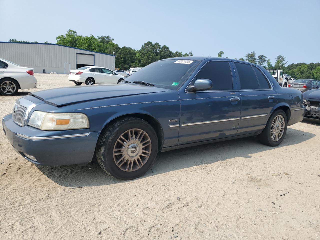 2011 Mercury Grand Marquis LS, VIN 2MEBM7FV6BX605622 — Vandalism