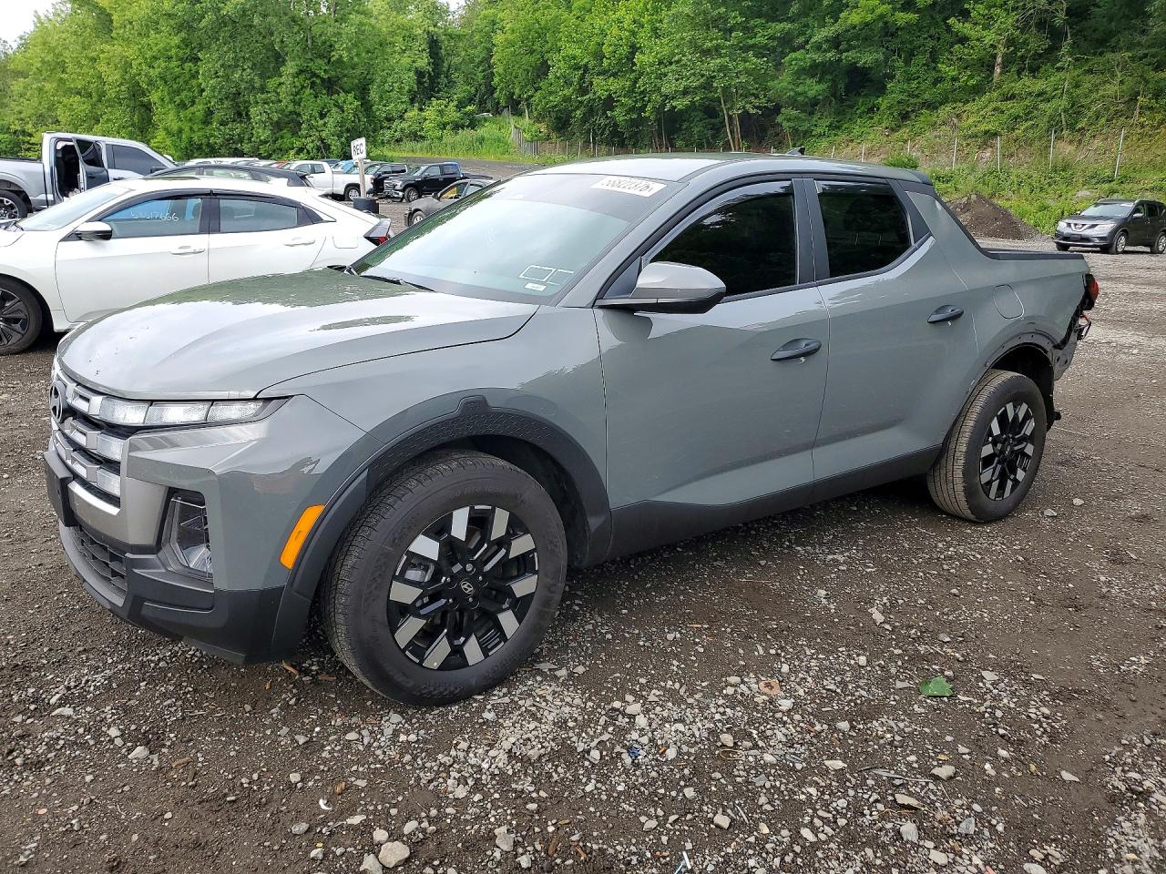 2026 Hyundai Santa Cruz SE, VIN 5NTJADDE5TH165176 — Rear end