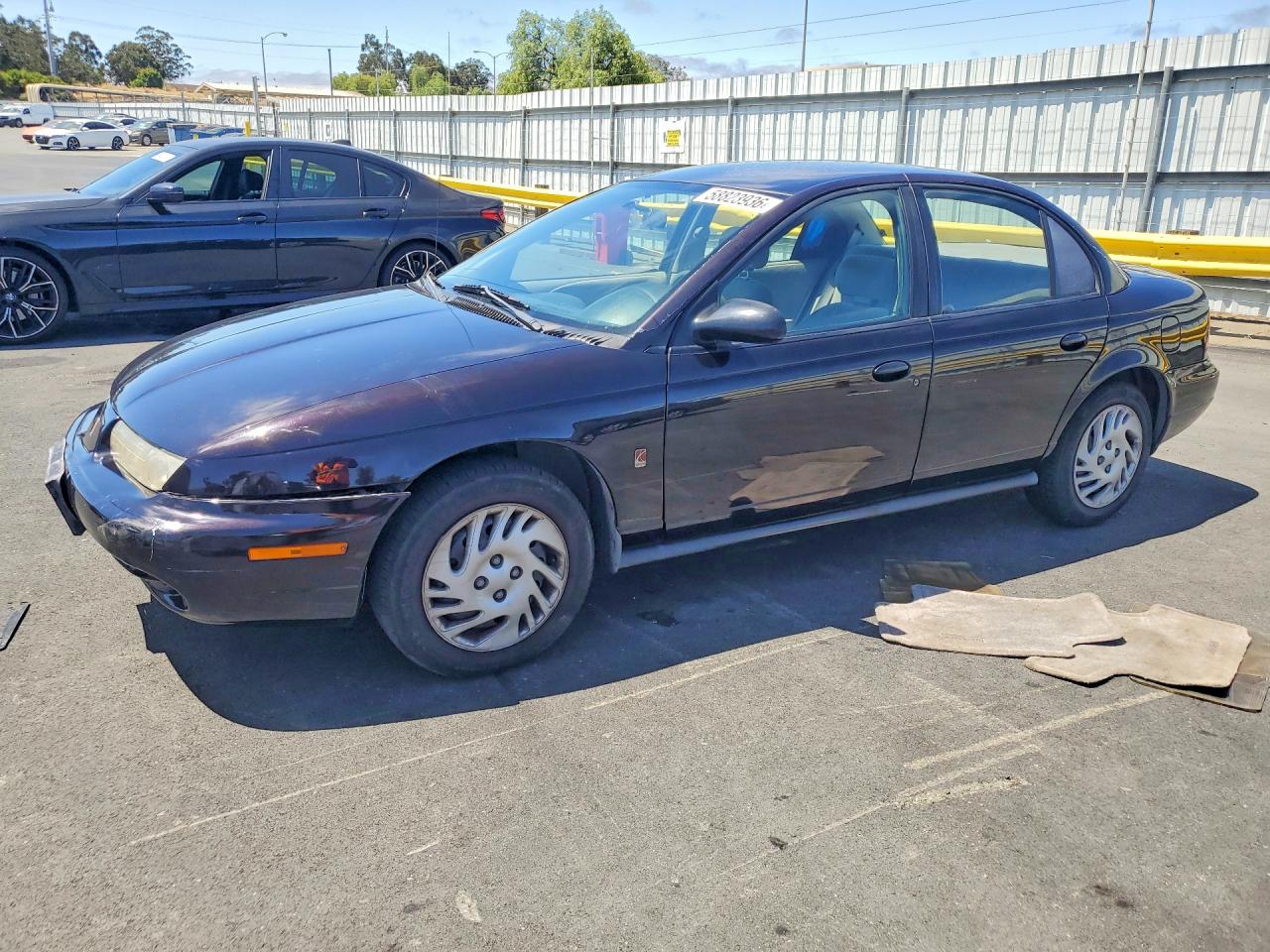 1999 Saturn SL, VIN 1G8ZJ5274XZ151645 — Front end
