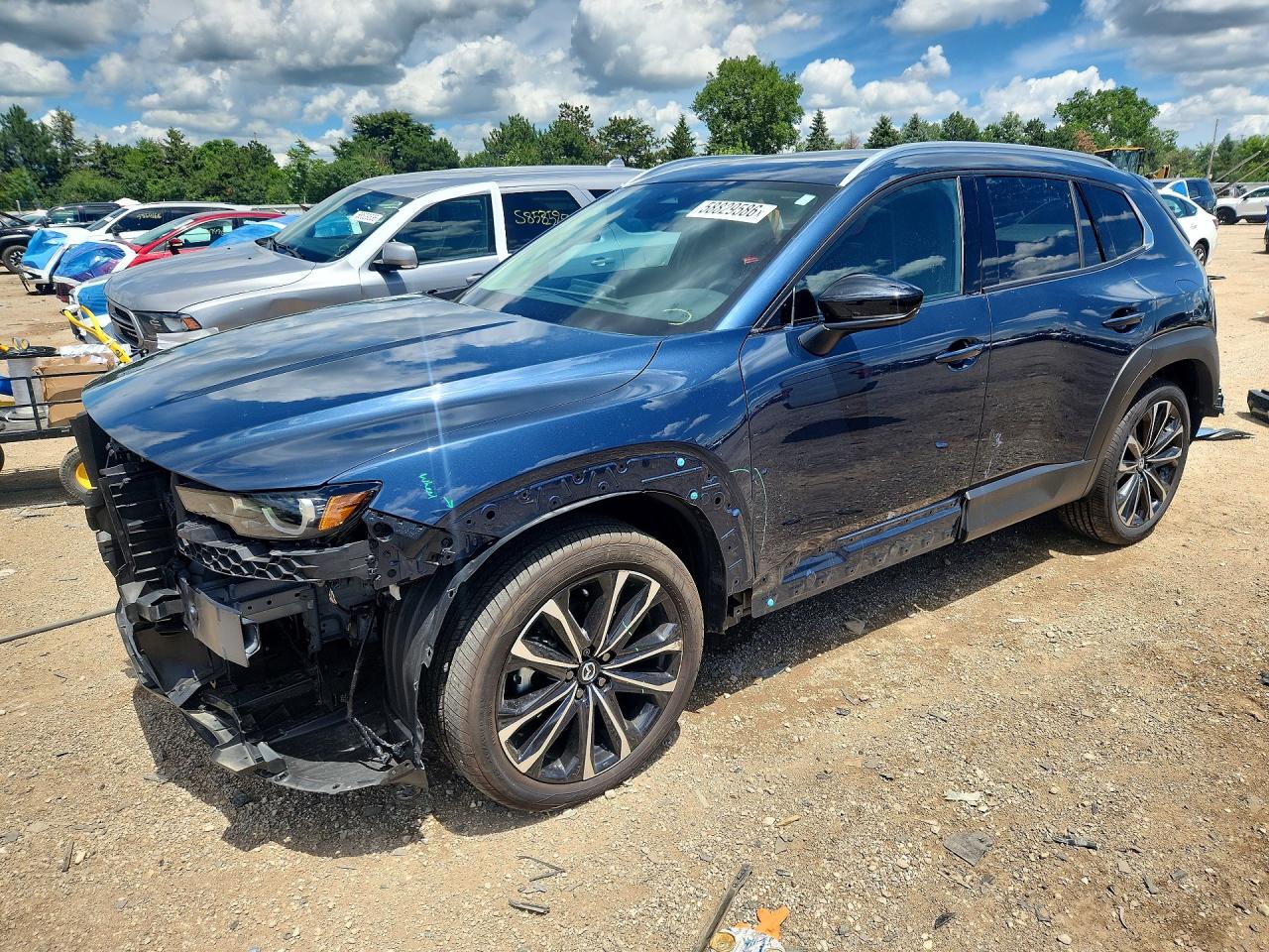 2026 Mazda CX-50 2.5 S Premium, VIN 7MMVABDL4TN456867 — Rear end