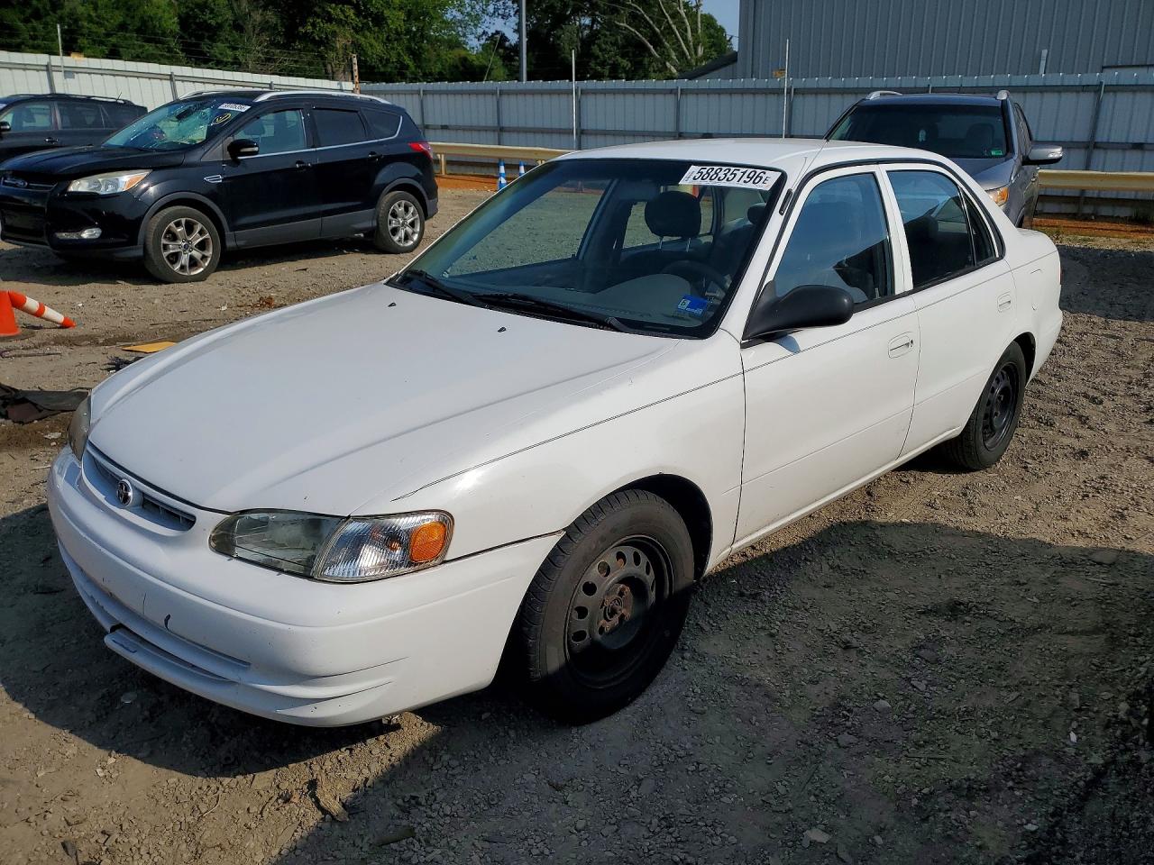 2000 Toyota Corolla CE, VIN 1NXBR12EXYZ384124 — Front end