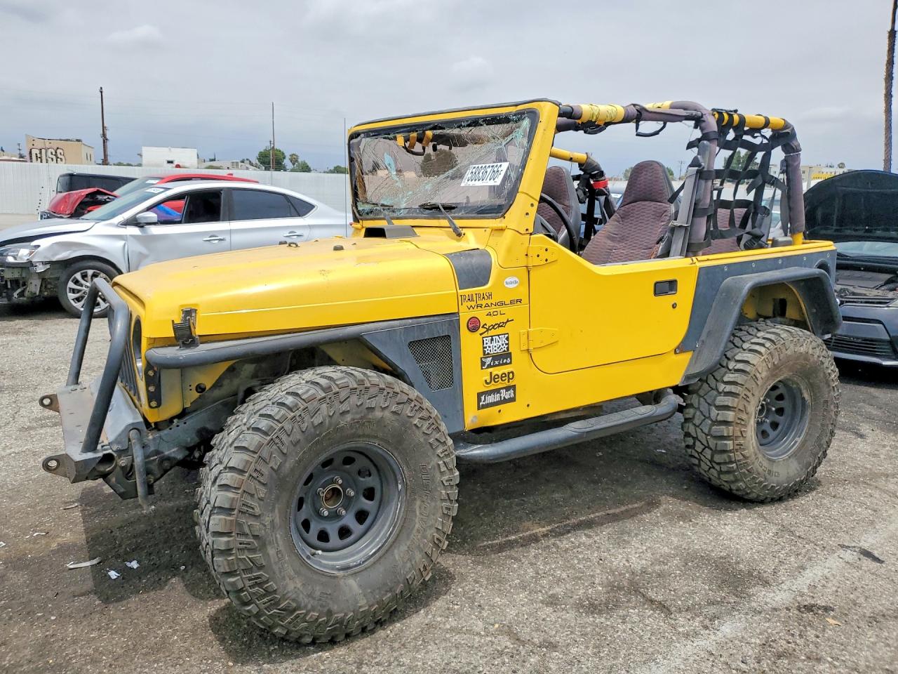 2000 Jeep Wrangler Sport, VIN 1J4FA49S0YP738560 — Front end