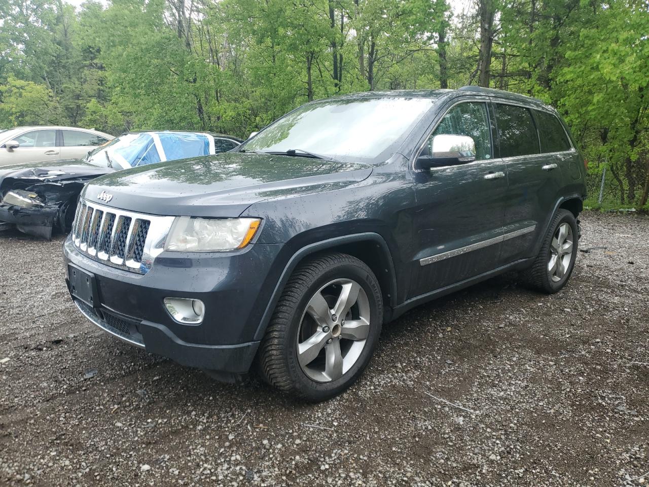 2013 Jeep Grand Cherokee Overland, VIN 1C4RJFCG3DC508435 — Rear end