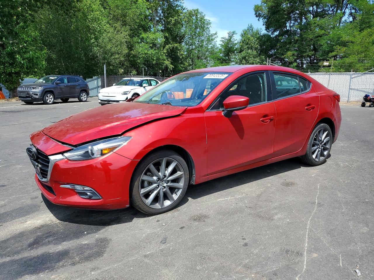 2018 Mazda 3 Grand Touring, VIN 3MZBN1W35JM159559 — Front end