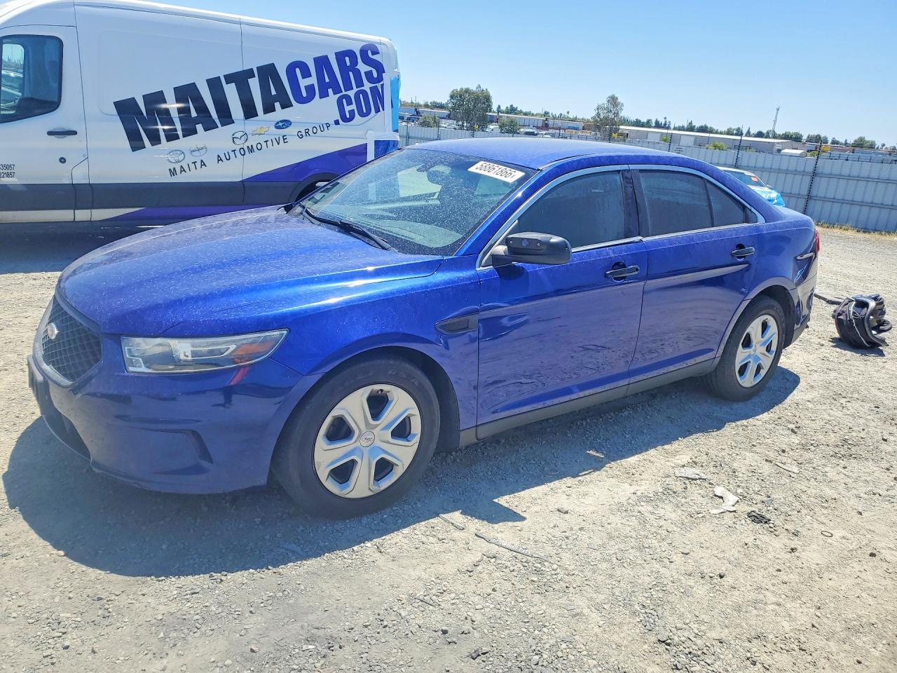 2015 Ford Police Interceptor, VIN 1FAHP2MK2FG182134 — Side