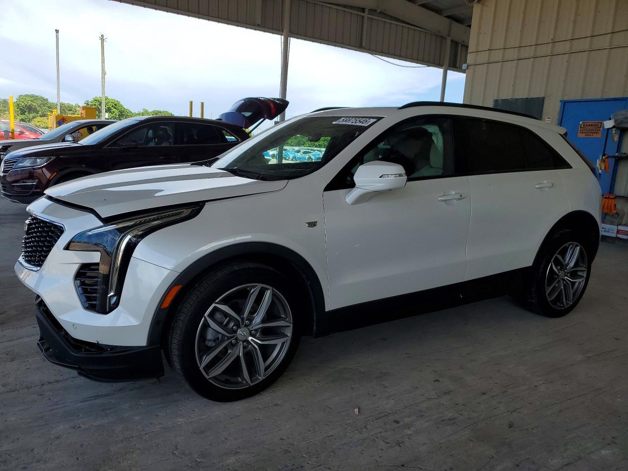 2023 Cadillac XT4 FWD Sport, VIN 1GYFZER4XPF101745 — Front end