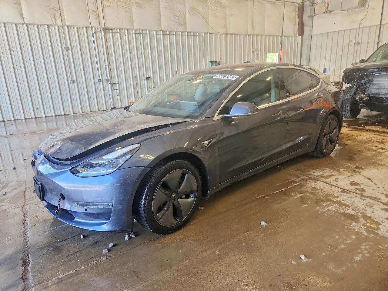 2019 Tesla Model 3 Long Range, VIN 5YJ3E1EB3KF191688 — Front end