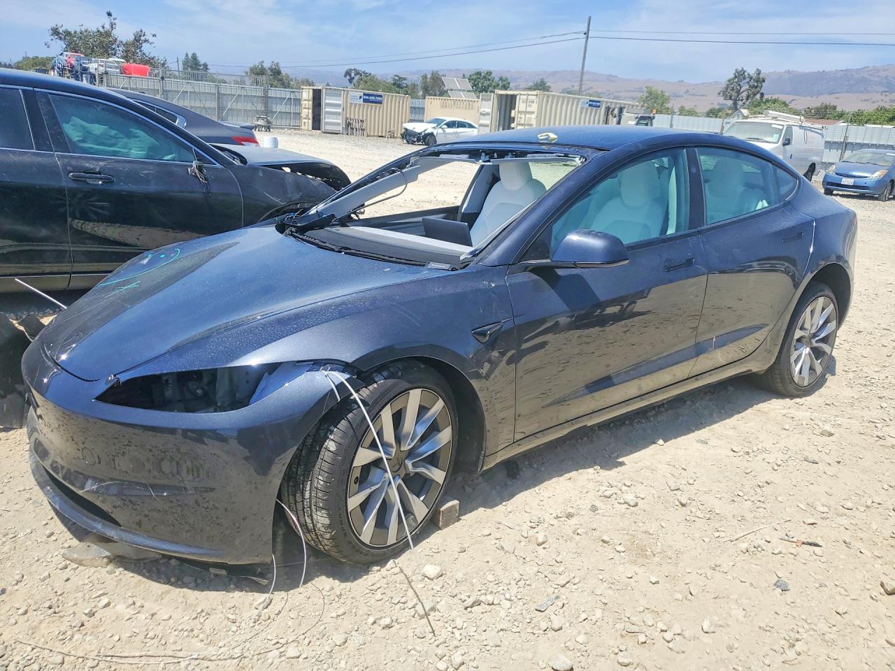 2026 Tesla Model 3 Premium, VIN 5YJ3E1EB5TF159732 — Front end