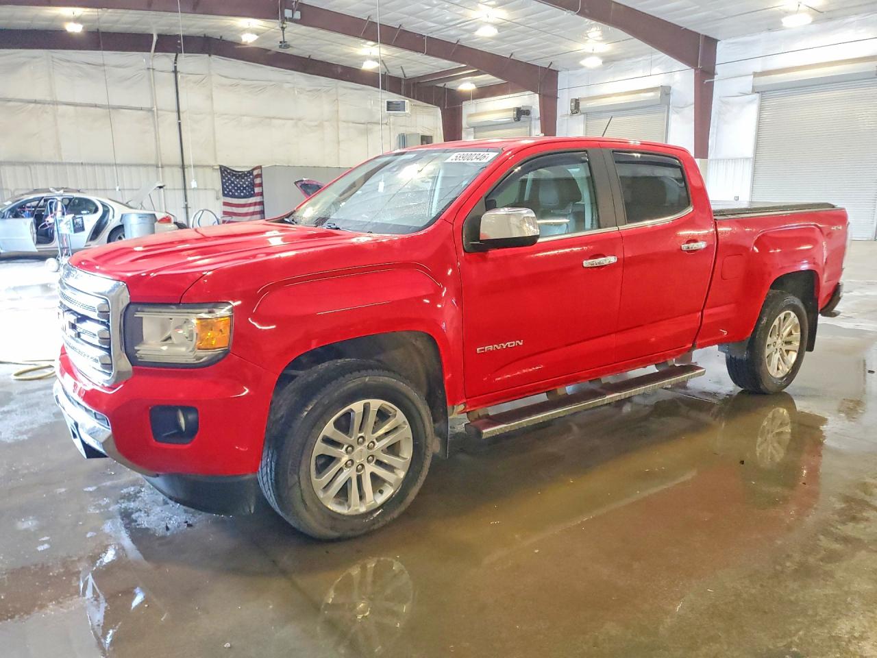 2015 GMC Canyon 4WD SLT, VIN 1GTG6CE39F1243049 — Hail