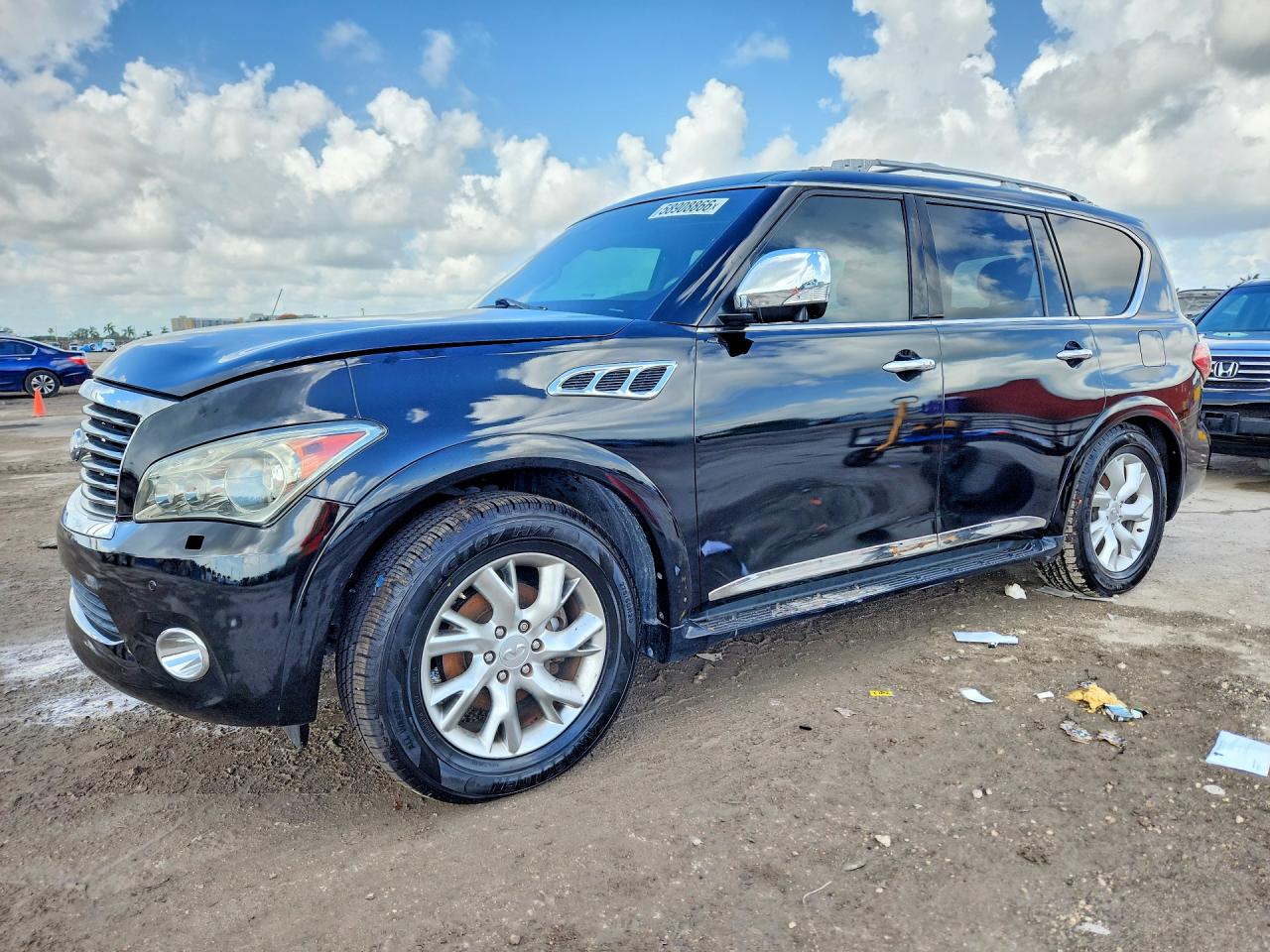 2011 Infiniti QX56 8-passenger, VIN JN8AZ2ND9B9700748 — Missing or altered VIN