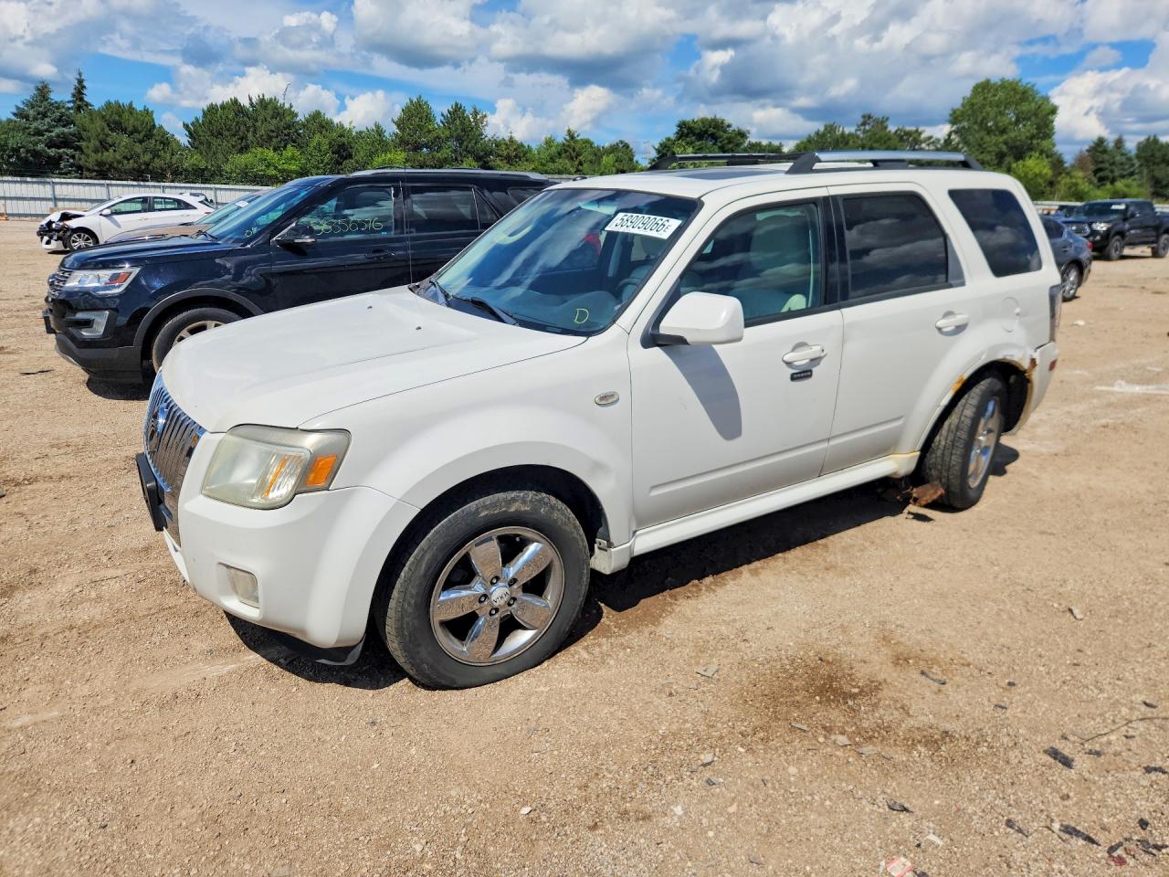 2009 Mercury Mariner Premier, VIN 4M2CU87G19KJ07203 — Rear end