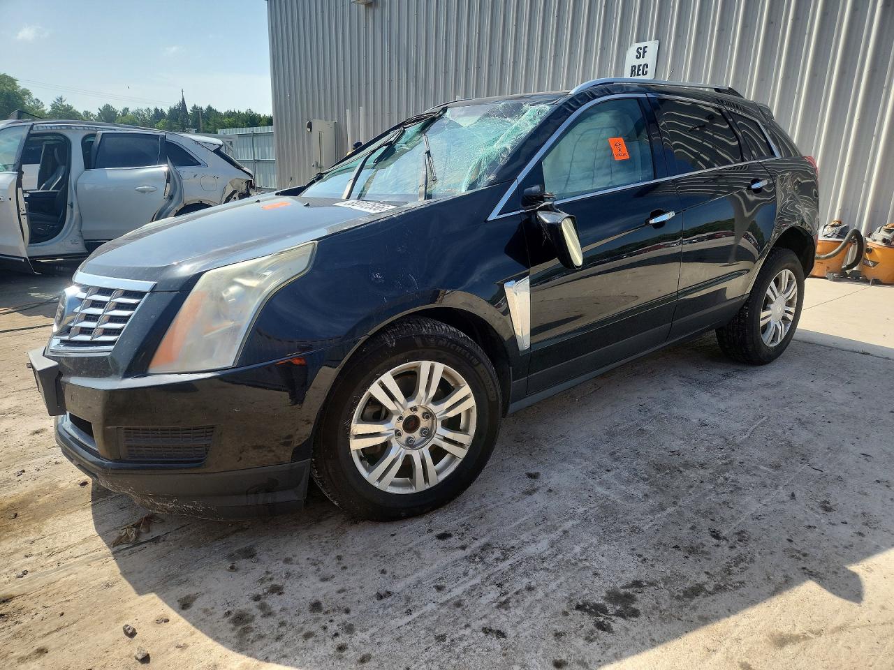 2013 Cadillac SRX Luxury Collection, VIN 3GYFNCE36DS597230 — Rollover