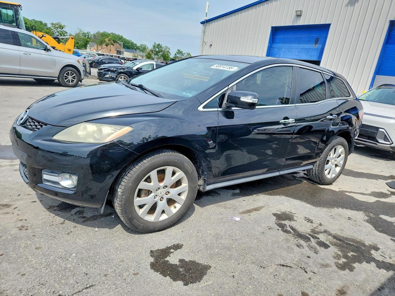 2009 Mazda CX-7 Touring, VIN JM3ER29L990229995 — Rear end