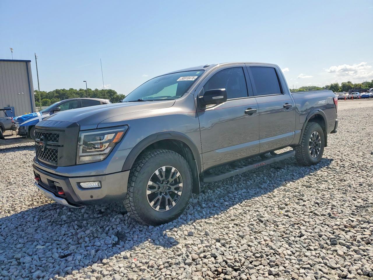 2021 Nissan Titan Pro-4X, VIN 1N6AA1ED5MN526407 — Side