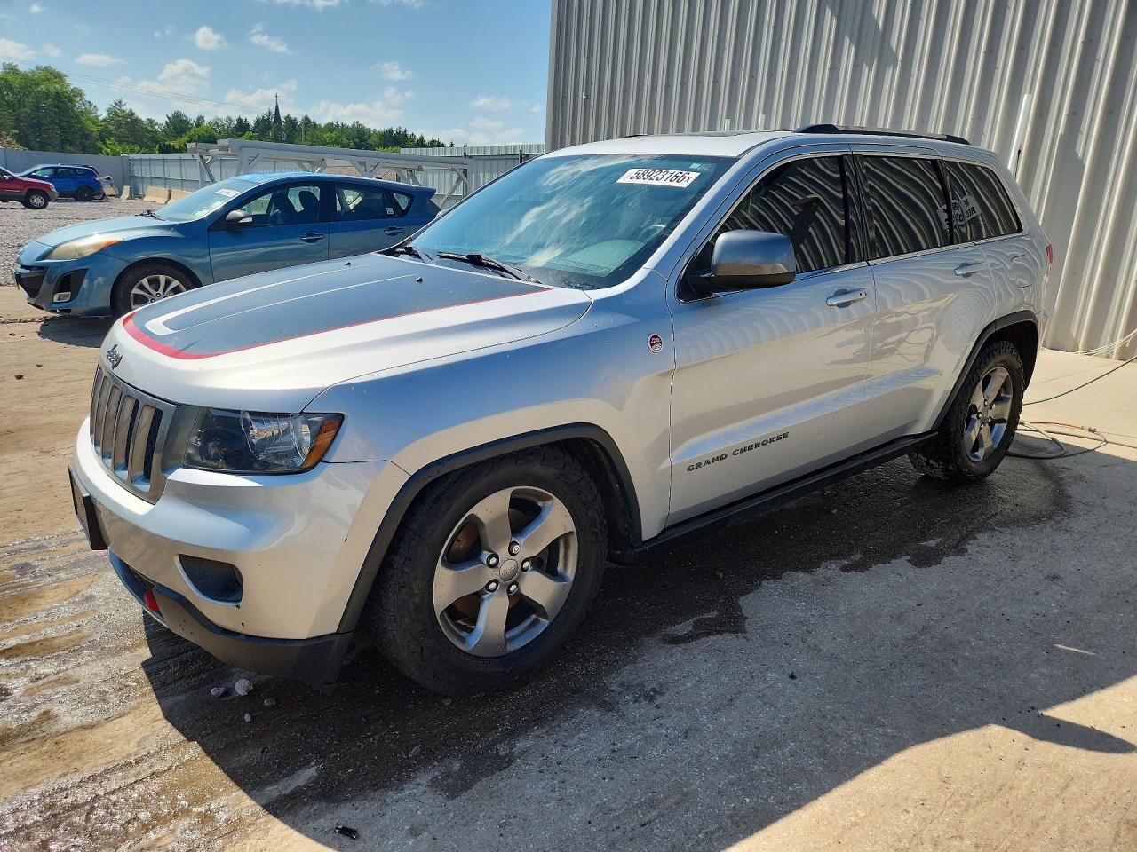 2013 Jeep Grand Cherokee Laredo Trailhawk, VIN 1C4RJFAT8DC591327 — Vandalism