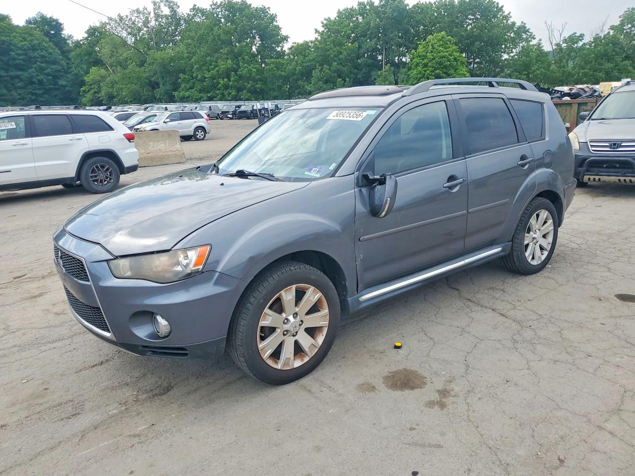 2012 Mitsubishi Outlander SE, VIN JA4JT3AW4CU000445 — Vandalism