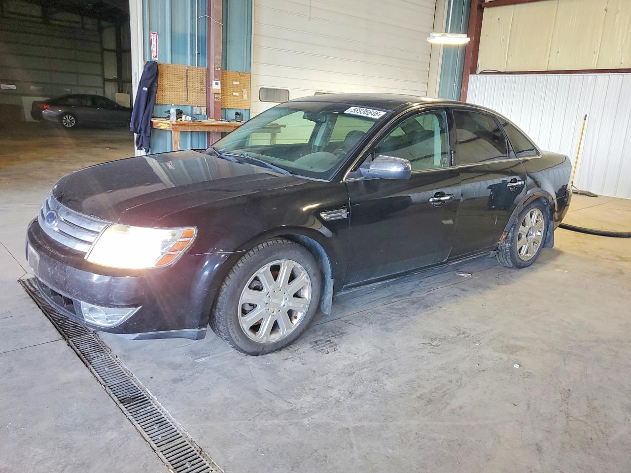 2008 Ford Taurus Limited, VIN 1FAHP25W98G134182 — Зад