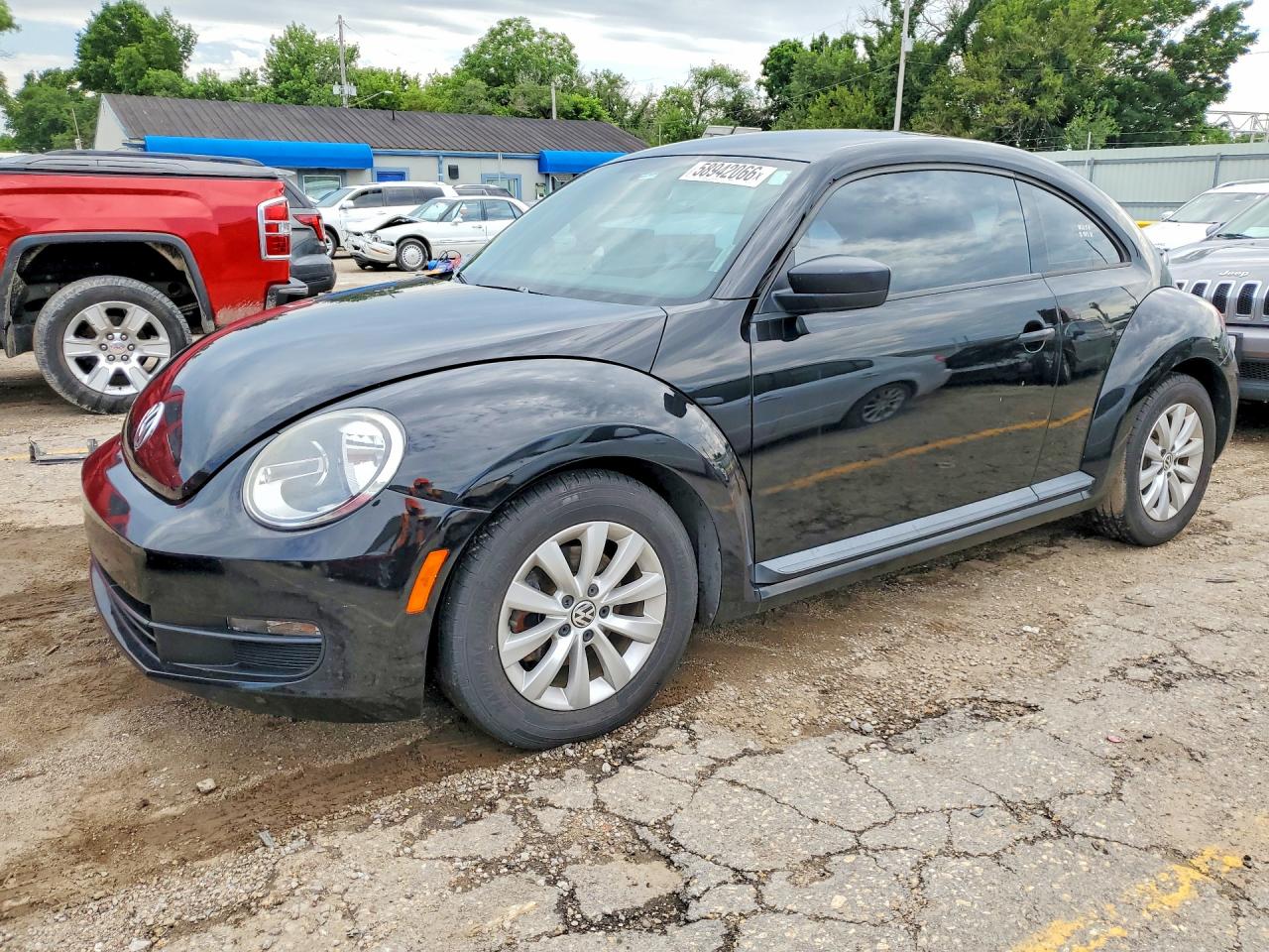 2014 Volkswagen Beetle Entry, VIN 3VWFP7AT7EM624080 — Hail