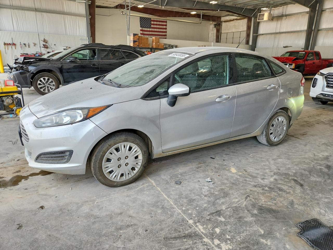 2016 Ford Fiesta S, VIN 3FADP4AJ6GM167441 — Бок