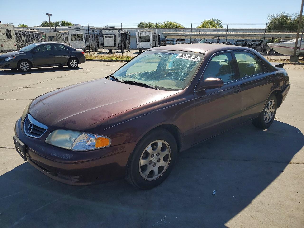 2001 Mazda 626 LX, VIN 1YVGF22C115233352 — Rear end