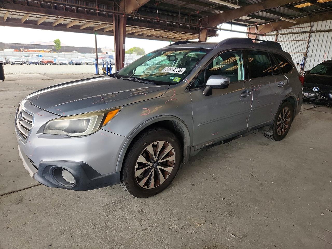 2016 Subaru Outback Limited, VIN 4S4BSANC3G3247352 — Side