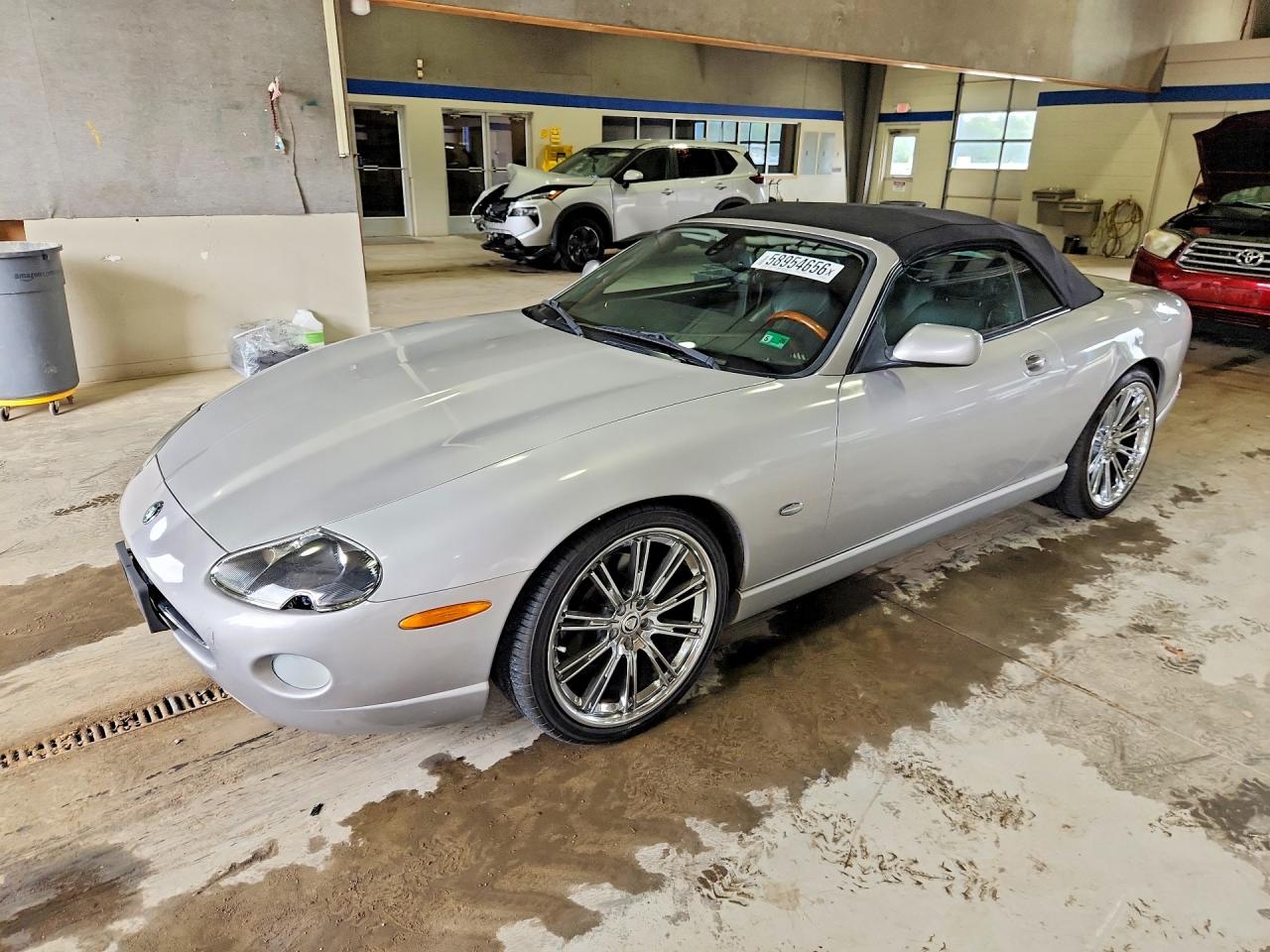 2005 Jaguar XK XK8, VIN SAJDA42C752A42338 — Rear end