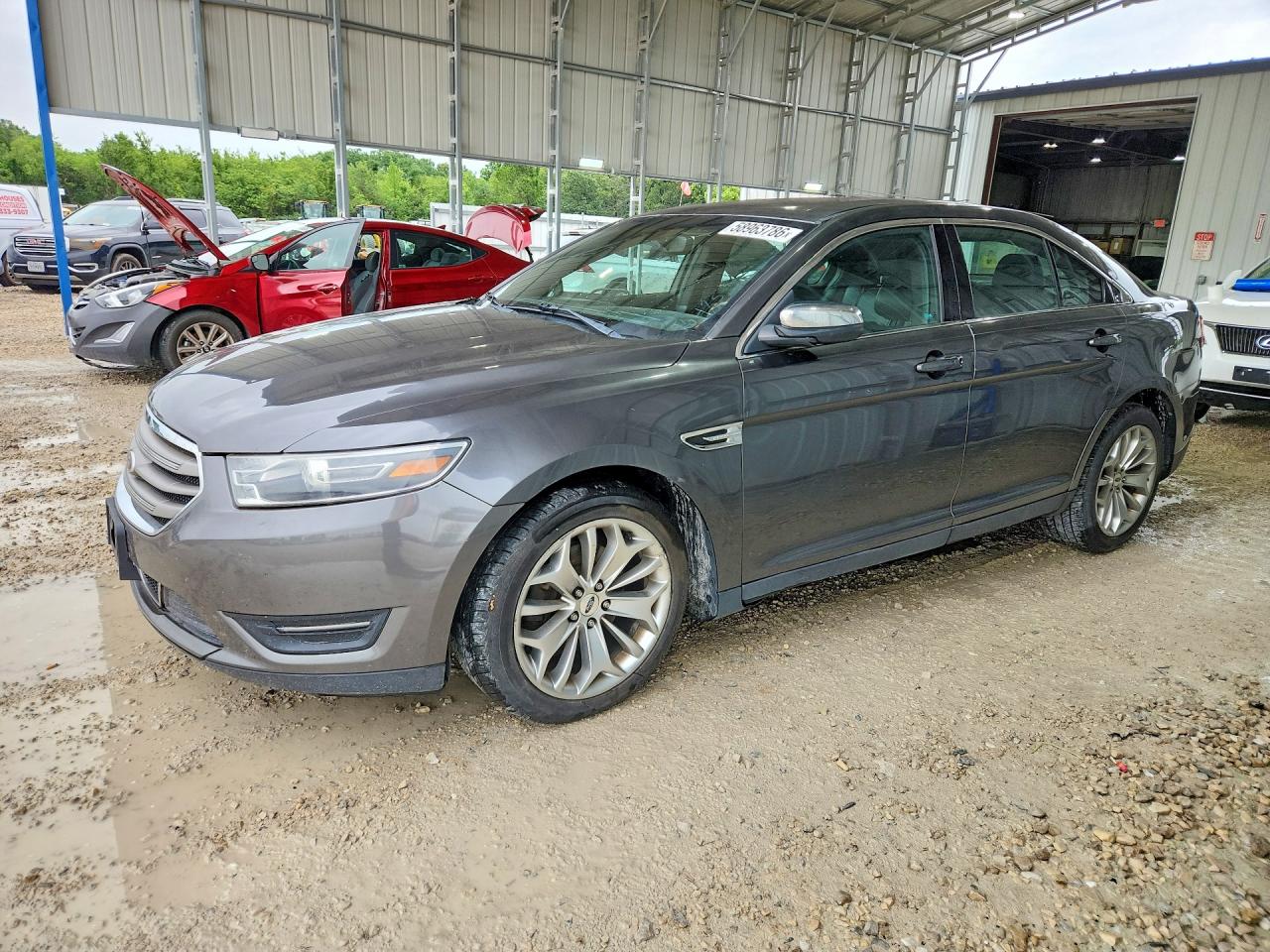 2015 Ford Taurus Limited, VIN 1FAHP2F84FG139268 — Град