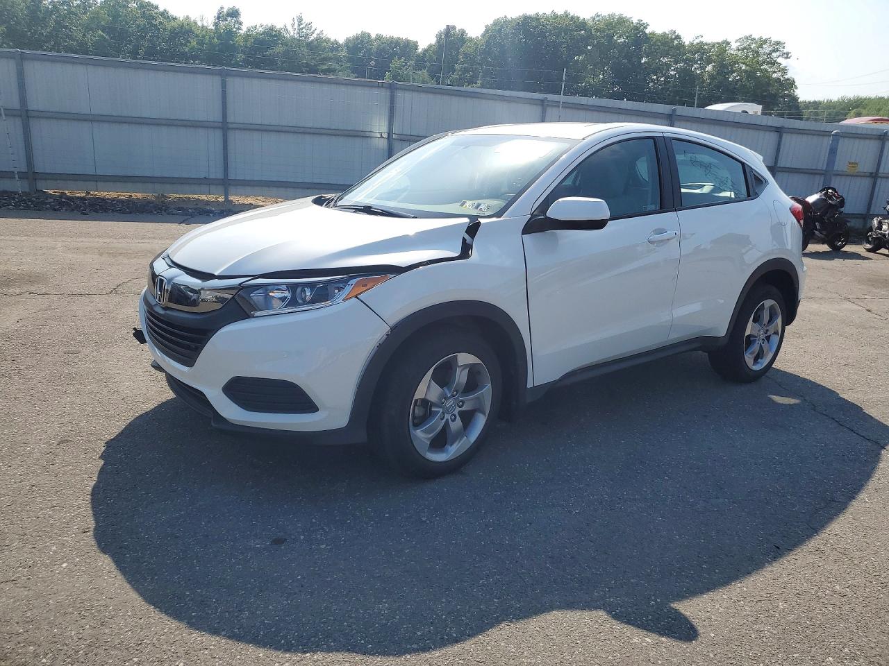 2022 Honda HR-V LX, VIN 3CZRU6H35NM765362 — Бок