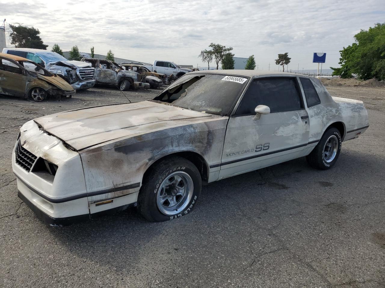 1984 Chevrolet Monte Carlo Sport SS, VIN 1G1AZ37G2ER226972 — Engine fire