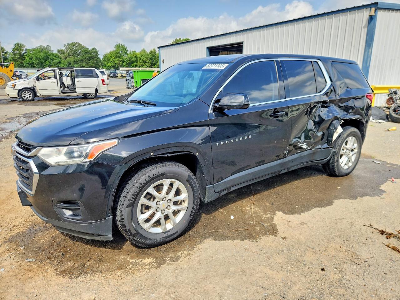 2018 Chevrolet Traverse LS, VIN 1GNERFKW4JJ137770 — Side