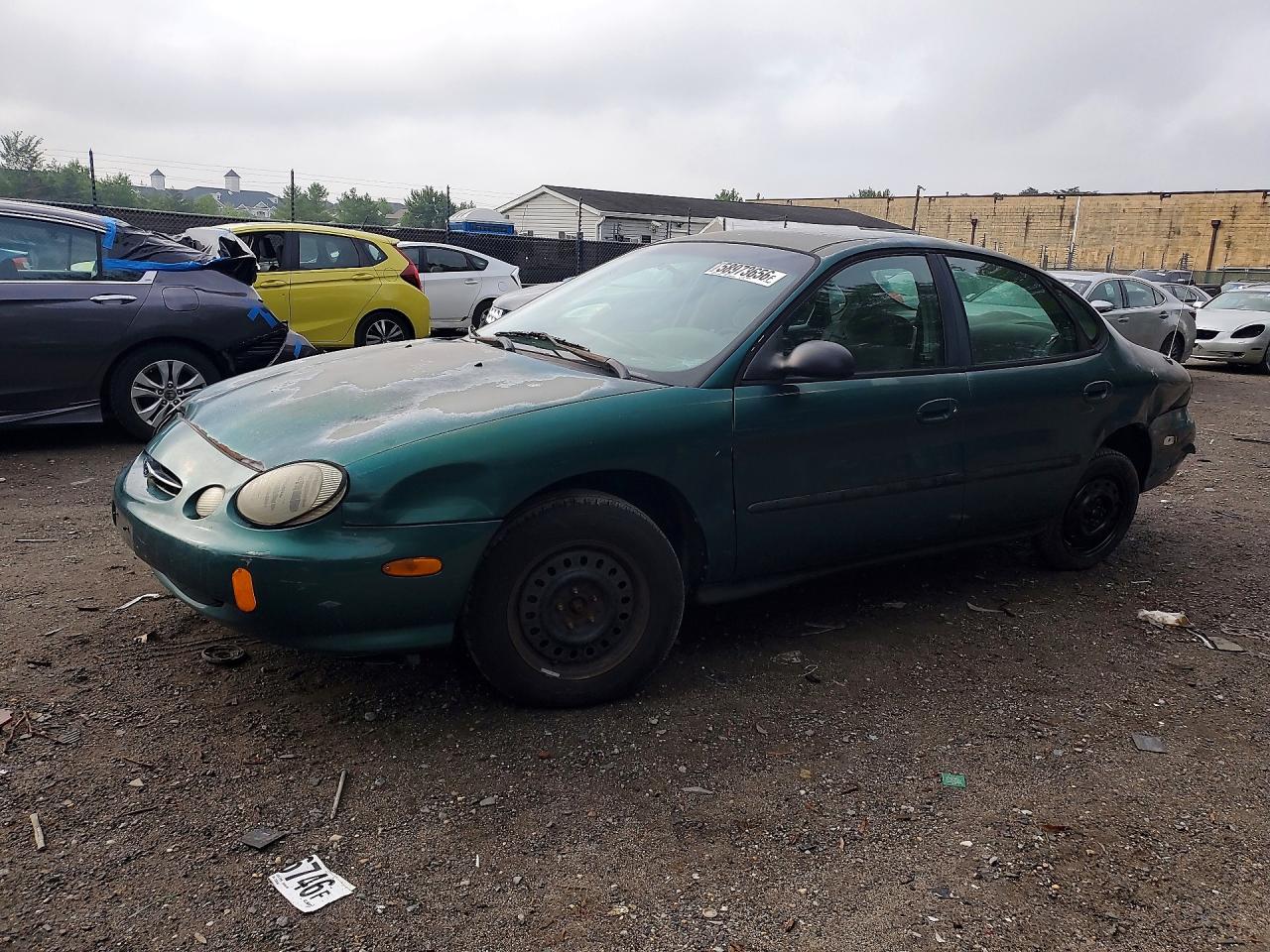 1999 Ford Taurus LX, VIN 1FAFP52UXXG126179 — All over