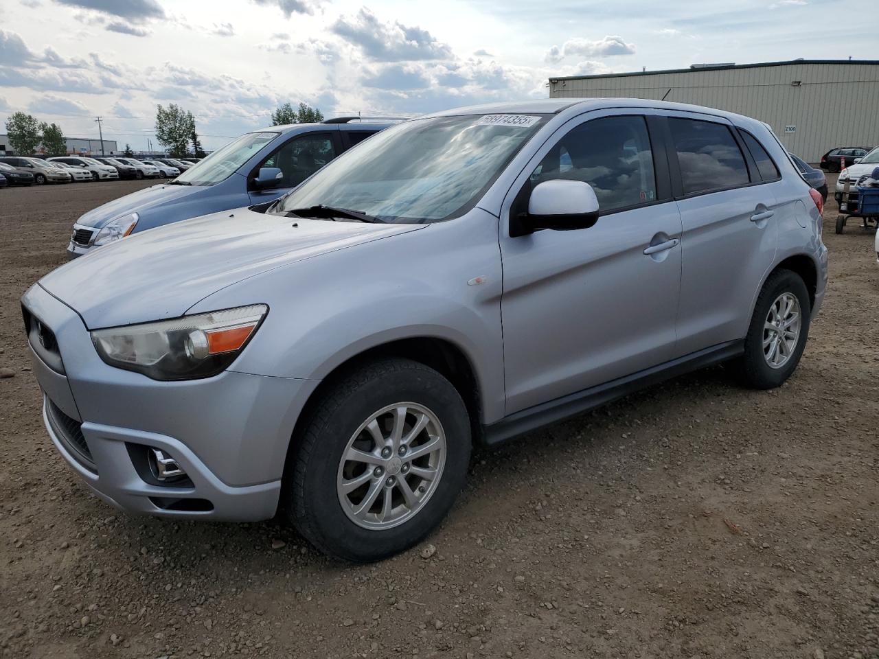 2011 Mitsubishi Outlander Sport SE, VIN JA4AJ3AU2BZ602752 — Rear end