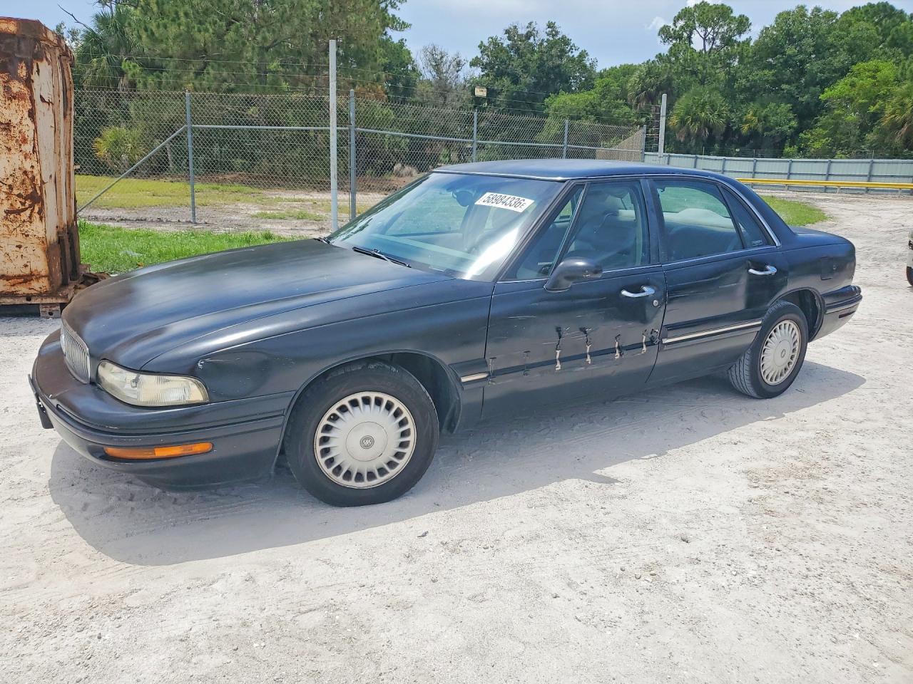 1999 Buick LeSabre Limited, VIN 1G4HR52K0XH415556 — Side